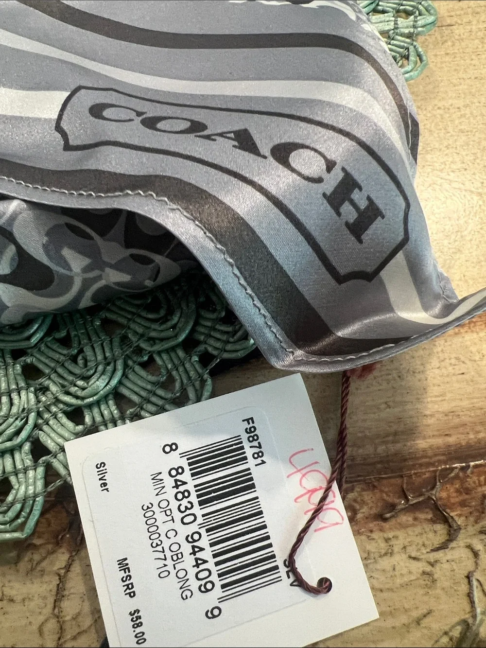 NWT 100% silk Coach Gray and White Signature Pattern scarf.