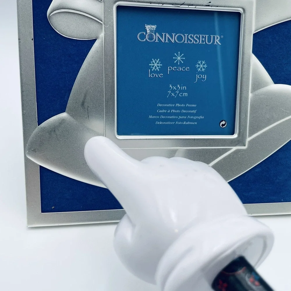 Connoisseur silver tone