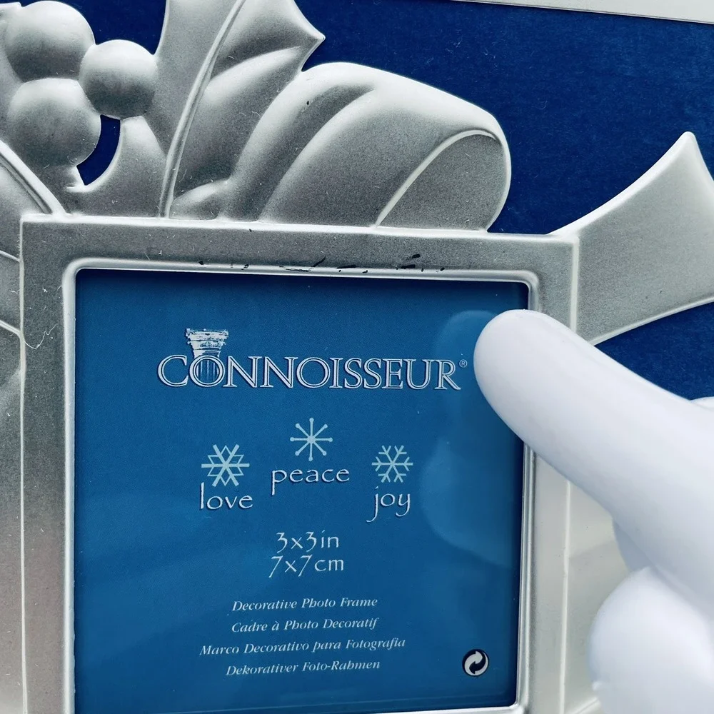 Connoisseur silver tone