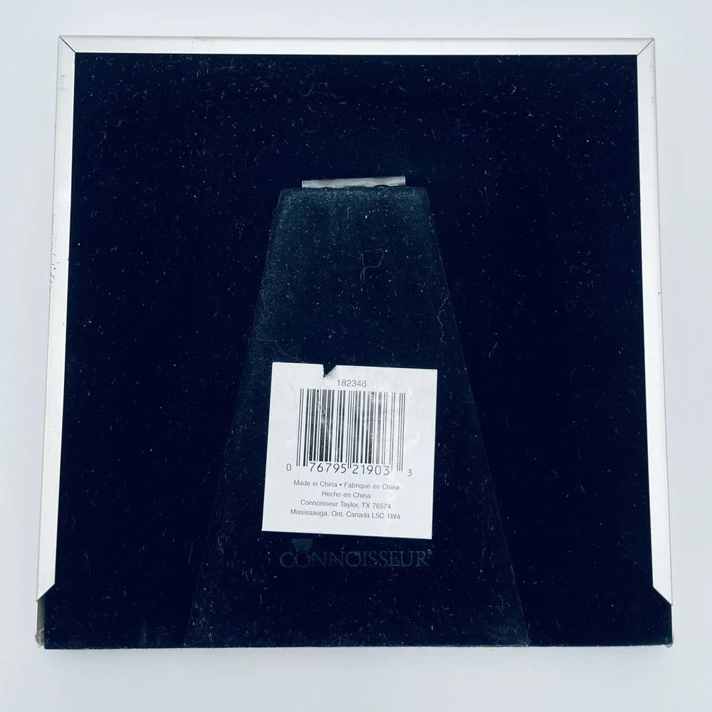 Connoisseur silver tone