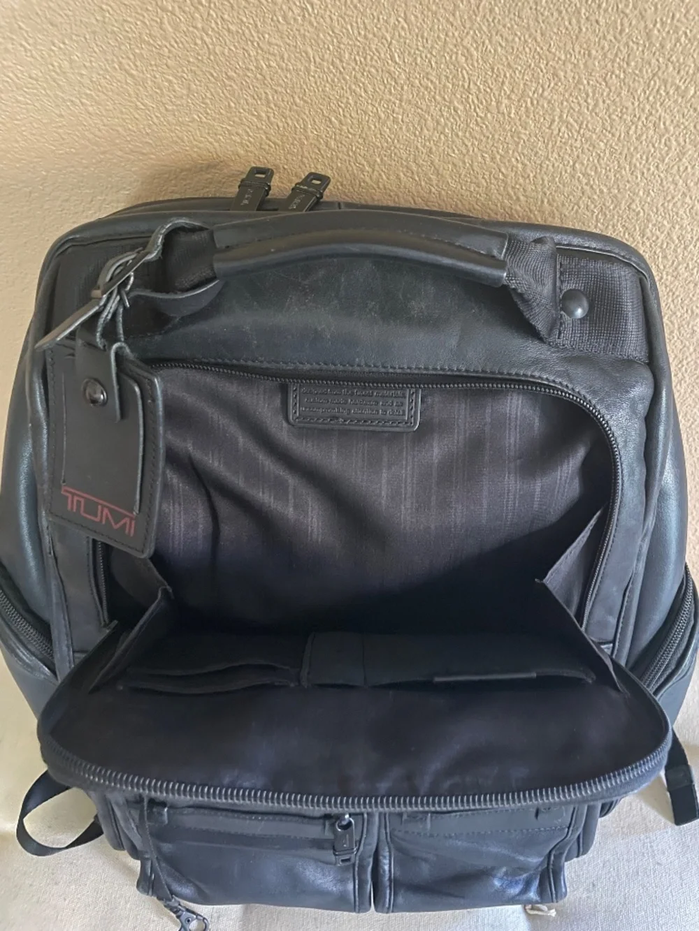Tumi black leather