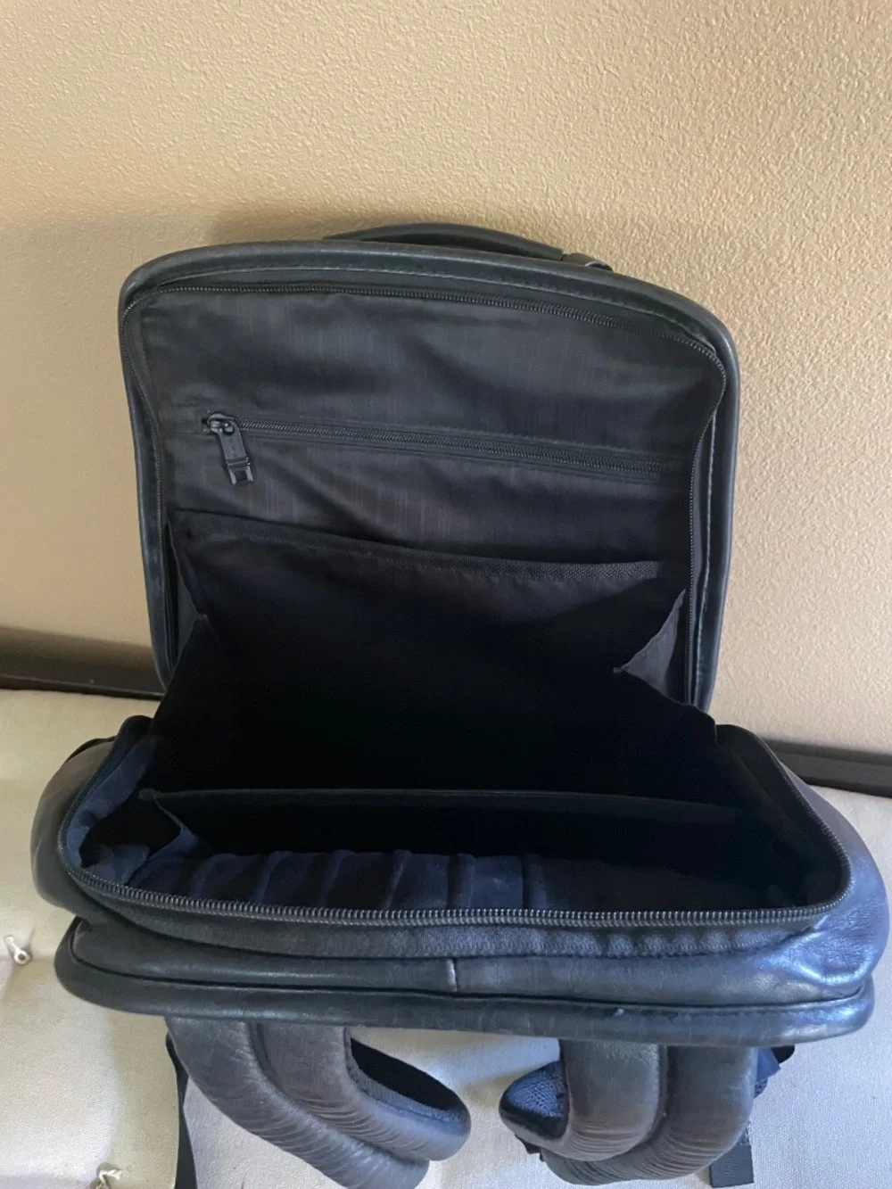 Tumi black leather