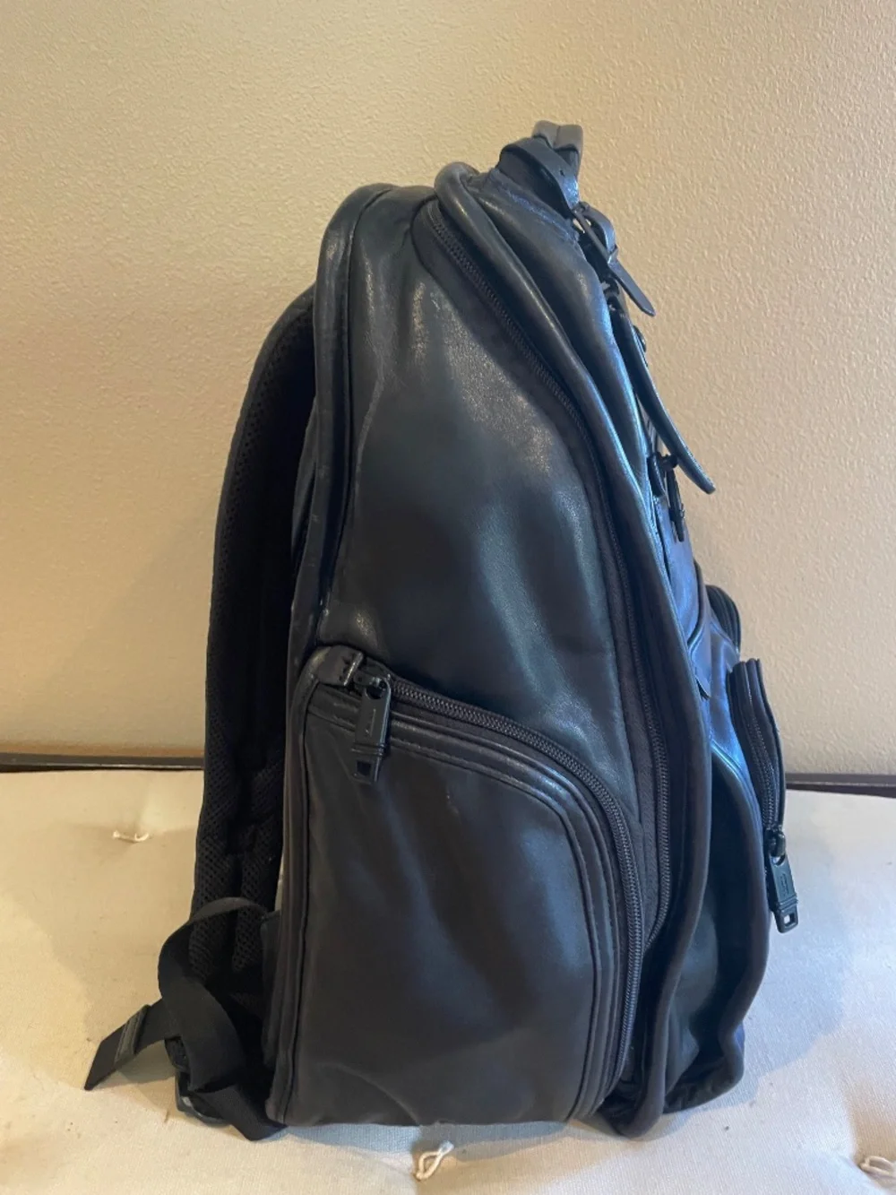 Tumi black leather