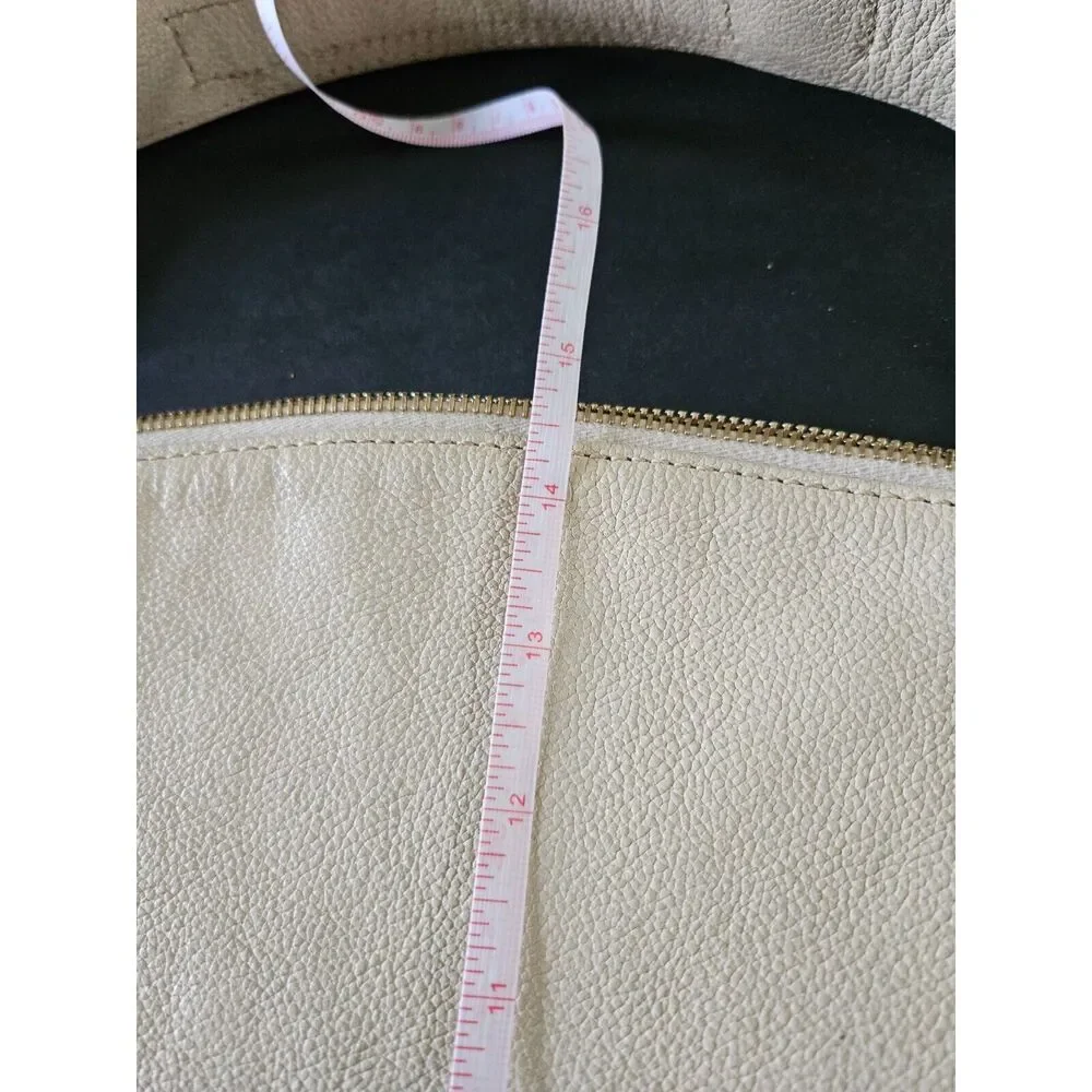 Dooney & Bourke tan leather hobo bag