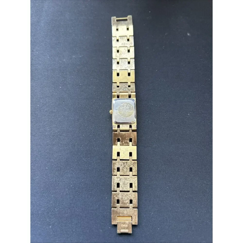 LA Express Silver Tone Dial Gold Tone Case And Band Women’s Quartz Watch