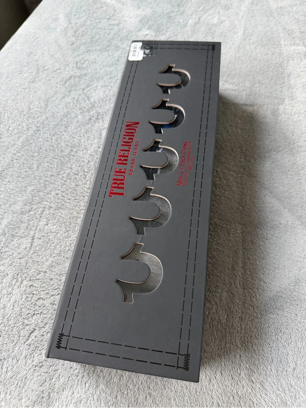 True Religion Black Gift Box with Red Logo and Silver Horseshoe Cutouts