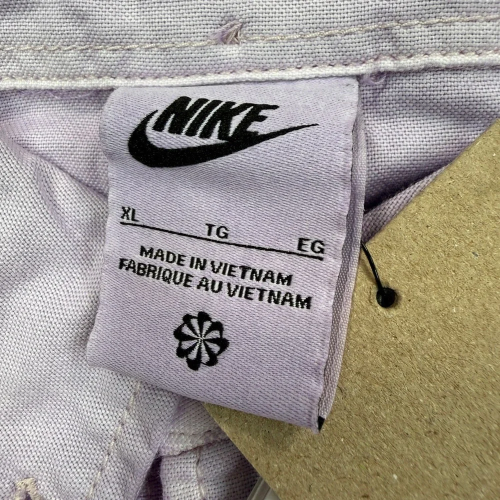 Nike sportswear button