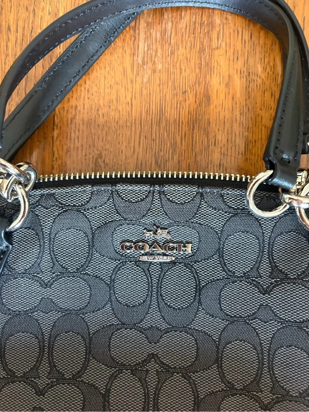 Coach black signature