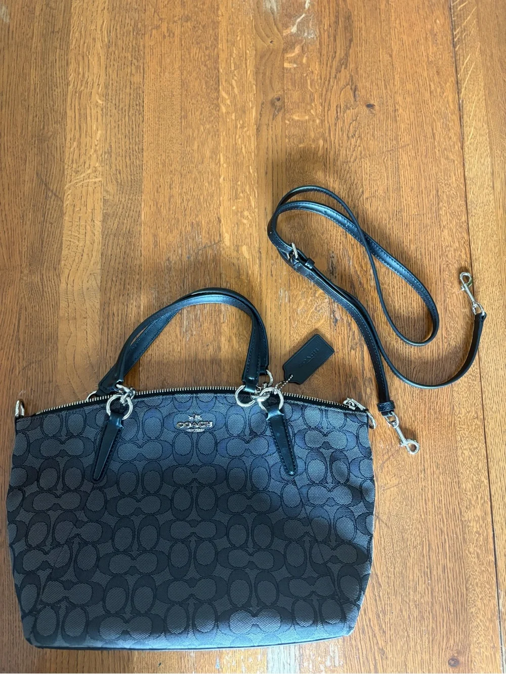 Coach black signature