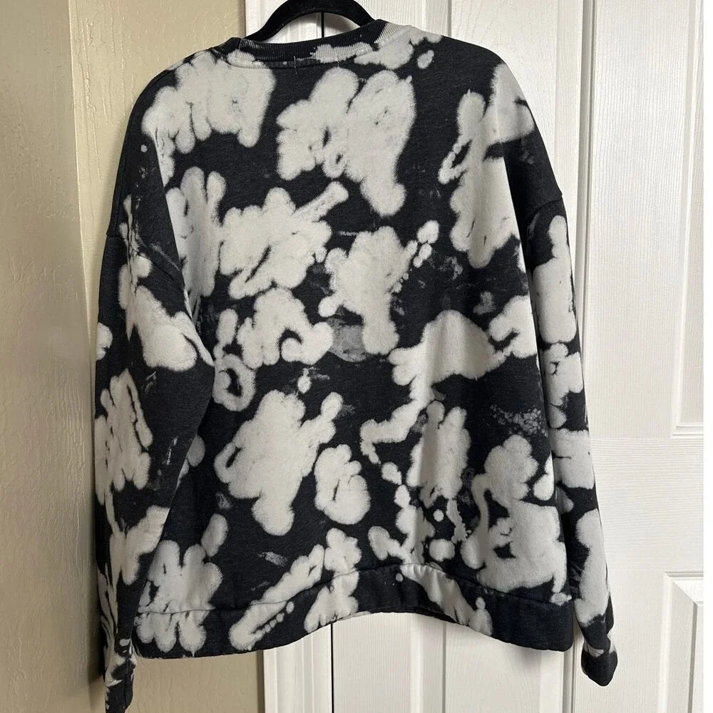 skull house crewneck graphics reminiscent