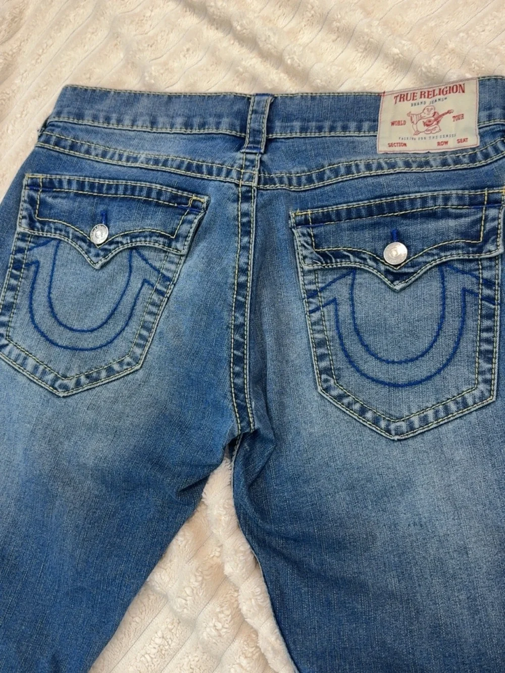 True Religion Men's Light Blue Denim Jeans with Signature Pocket Stitch