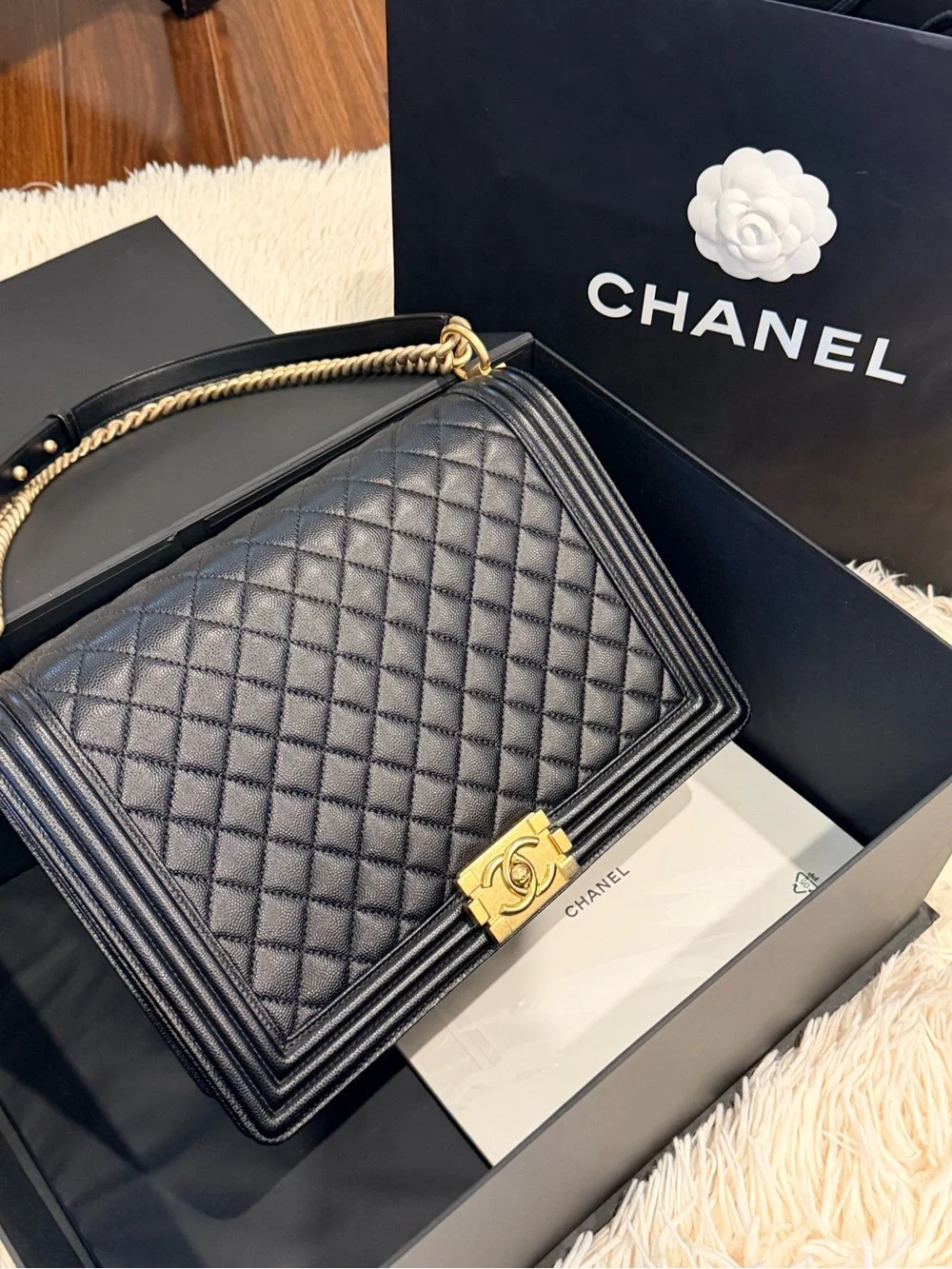 CHANEL Black Quilted Shoulder Bag with Gold Hardware and Chain Strap
