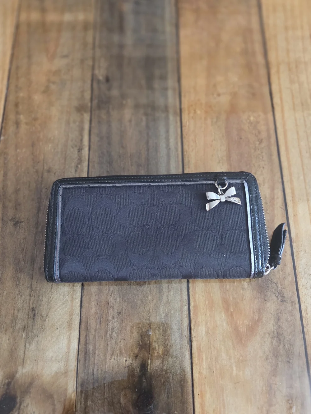 Coach Black Signature Zip-Around Wallet with Bow Charm